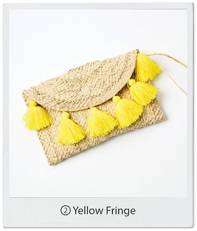 フリンジつきバッグ（19×29.5） 14,850円／ジャーディン デル シエロ（ジャック・オブ・オール・トレーズ プレスルーム）　鮮やかな黄色のフリンジも、かごと同系色だから奇抜に見えない。