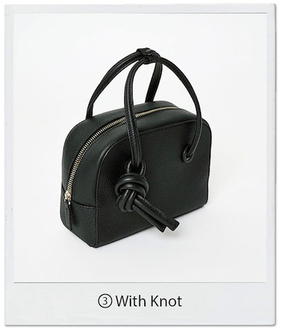 ノットハンドバッグ（15×20×8） 40,700円／VASIC（ヴァジックジャパン）　どんな装いにもなじみやすい、上部をカーブさせた形。チャームのようなノットの装飾がシンプルな黒にメリハリづけ。